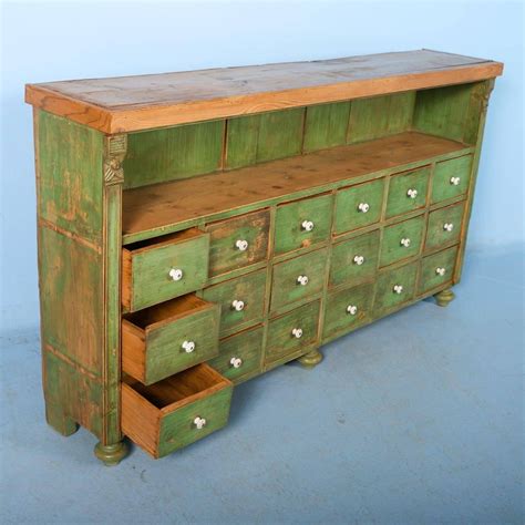 The cabinet is beautifully weathered and is beautiful in a hall or the living room. Antique Green Painted Multi-Drawer Cabinet from Romania ...