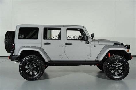 Selectable tire fill alert, cluster 7.0 tft color display, integrated center stack radio, air filtering. 2015 Jeep Wrangler Unlimited Kevlar paint lift kit leather ...