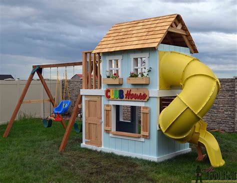 Playgroud with swings, slide and playhouse. DIY Clubhouse Play Set - Her Tool Belt