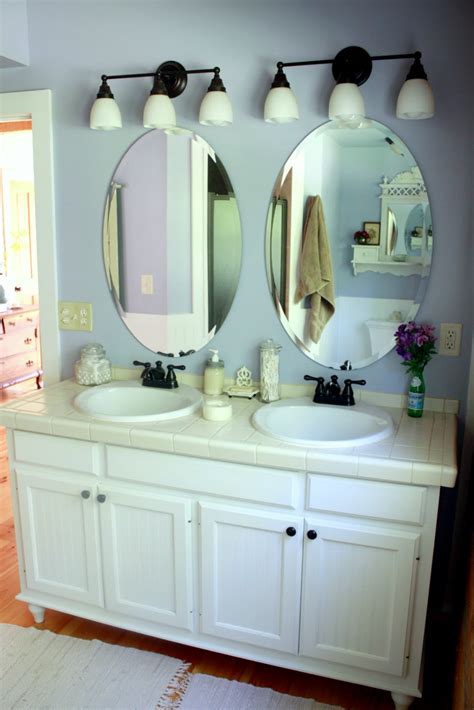 Vanity mirrors are an absolute necessity in the bathroom, working in tandem with vanity light fixtures to help you complete daily tasks like grooming, styling your hair, or putting on makeup. Carolina Country Living: House Tour: The Master Bathroom
