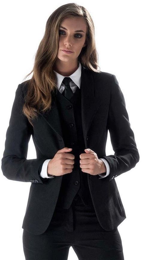 girl dressed formal in three piece pants suit with white shirt and tie tieswomen