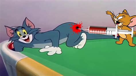 He is a yellow duck. Tom y Jerry en Español | Cue Ball Cat + Tales Cat Got Your ...