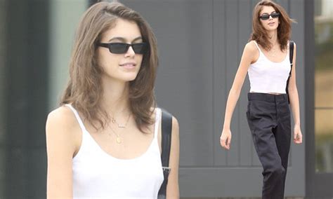Kaia Gerber Stuns In White Vest Top And High Waisted Black Trousers