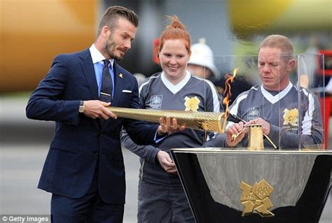 Beckham Lights Olympic Fuse As Symbolic Flame Arrives In Britain For 70