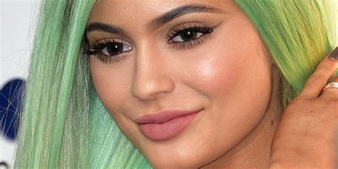 kylie jenner face kylie cosmetics is adding four new glosses to the line kylie