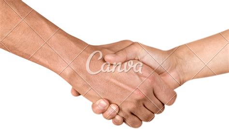 Closeup Of Two People Shaking Hands Photos By Canva