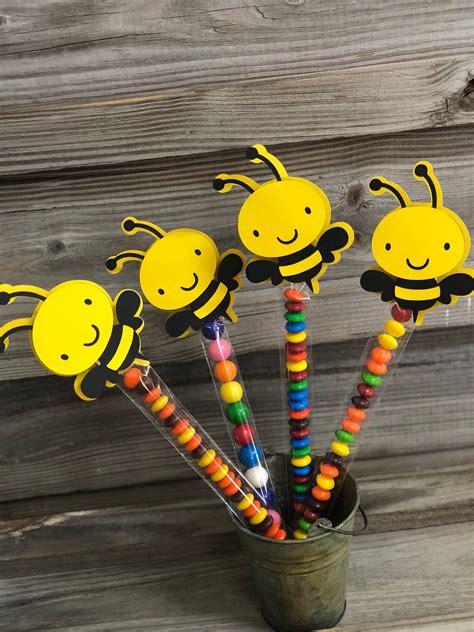 Bright yellow contrasted with black, honeycomb or striped patterns, and sweet honey flavors are all great ways to bring the bee theme to life. Set of 12 - Yellow and Black BUMBLE BEE Clips-Baby Shower ...