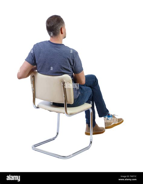 Back View Of A Man Sitting On A Chair Rear View People Collection The