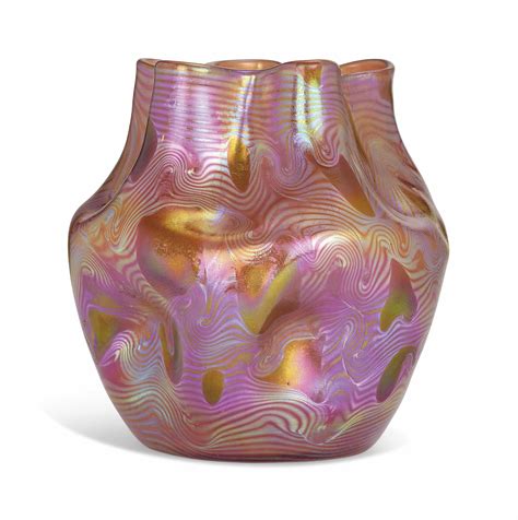 A Loetz Iridescent Dimpled Glass Vase With Undulating Neck Circa 1900