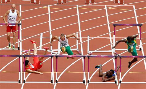 Liu Xiang Of China Crashes Out Of Olympic 110 Meter Mens Hurdles The