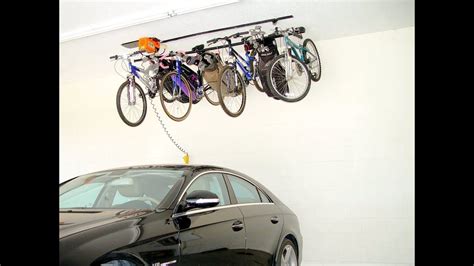 I dicided to install a ceiling mount bike lift for storing our bikes and free up some precious garage space. Garage Gator Motorized Electric Hoist GGR220 - YouTube