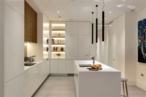 Minimalist concept which emphasizes the simple forms should be reflected in your kitchen cupboard. Kitchen Design Idea - White, Modern and Minimalist ...