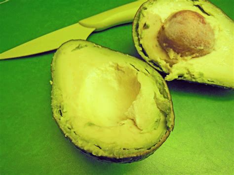 An avocado is a bright green fruit with a large pit and dark leathery skin. Avocado Salad Recipe and A Cool New Avocado Slicer ⋆ ...