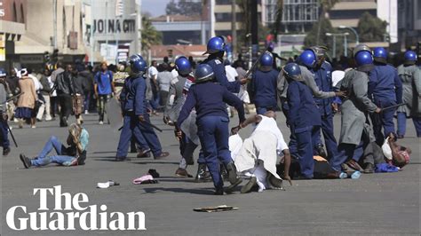 Zimbabwe Riot Police Use Teargas And Batons To Clear Protesters Youtube