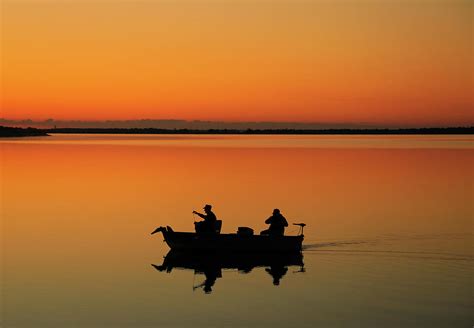 Fishing At Sunrise Photograph By Dan Sproul