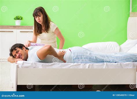 The Woman Doing Massage To Her Husband In Bedroom Stock Photo Image Of Hand Marriage