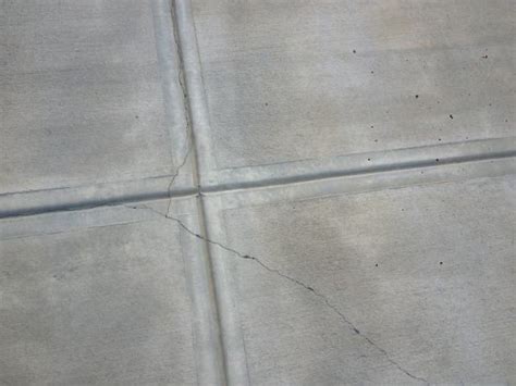 Our builder contracts a driveway company, so luckily we didn't have to find a concrete. Cracks in New Driveway - DoItYourself.com Community Forums