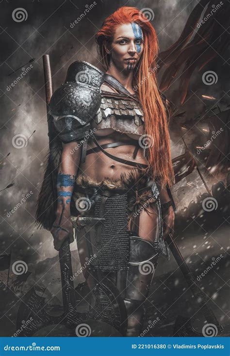 Nordic Woman Warrior With Axes In Battlefield Stock Photo Image Of
