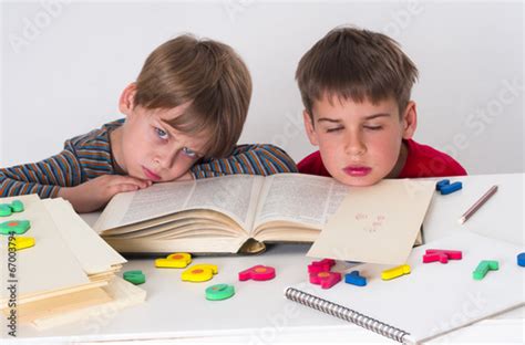 Bored Children Trying To Learn Stock Photo And Royalty Free Images