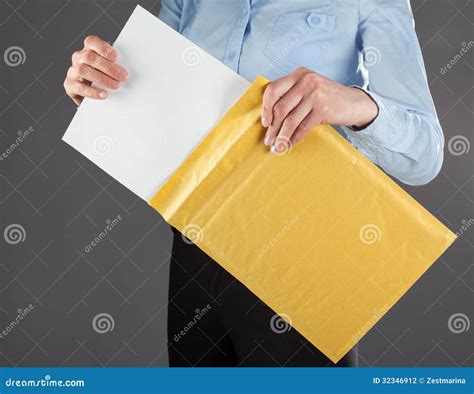 Businesswoman Taking Letter Out Of Envelope Stock Photo Image Of