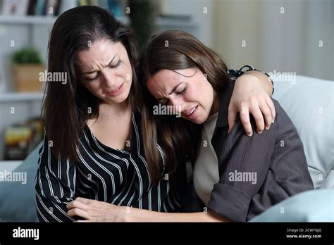 Two Women Hugging Home Hi Res Stock Photography And Images Alamy