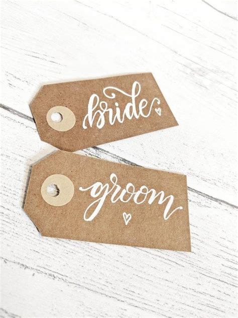Our wedding place card holders are both functional and elegantly ornamental — beautiful favors that hold name cards to mark guest seating at the reception dinner table. Six custom dinner table place card labels, wedding name ...