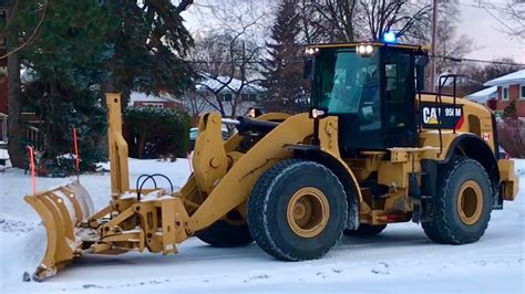 Snow Removal Cat Loader Plowing Snow Youtube