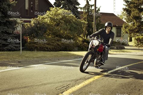 Motorcycle insurance can be cheaper to insure than car insurance, but it depends a good rider or safe rider discount: stock-photo-43384404-motorcycle-rider-with-open-face-helmet-copy-space | Levitt Insurance ...