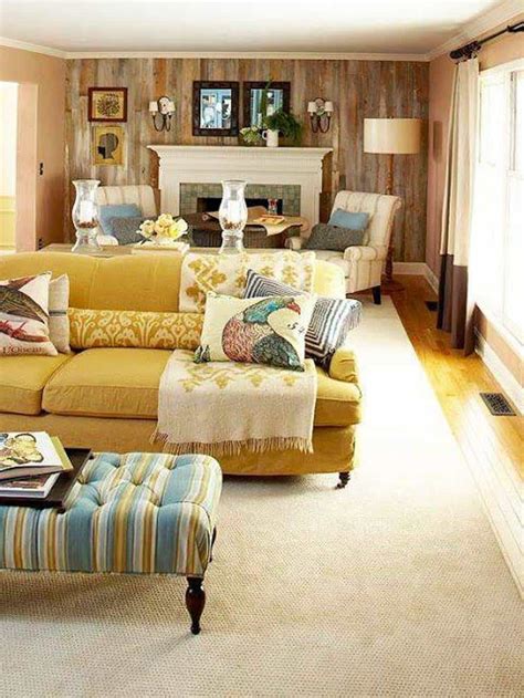 Narrow Living Room Design With Yellow Sofa And Fireplace And Mirrors