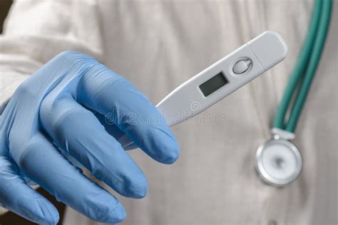 Hand Holding Digital Thermometer Stock Image Image Of Thermometer