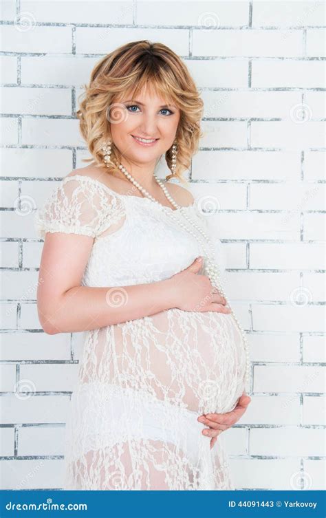 Beautiful Pregnant Woman In White Dress Hugging Tummy Stock Image Image Of Beautiful Belly