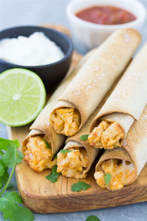 Once all the taquitos are on the baking sheet, lightly spray each one with cooking spray. Baked Chicken Taquitos