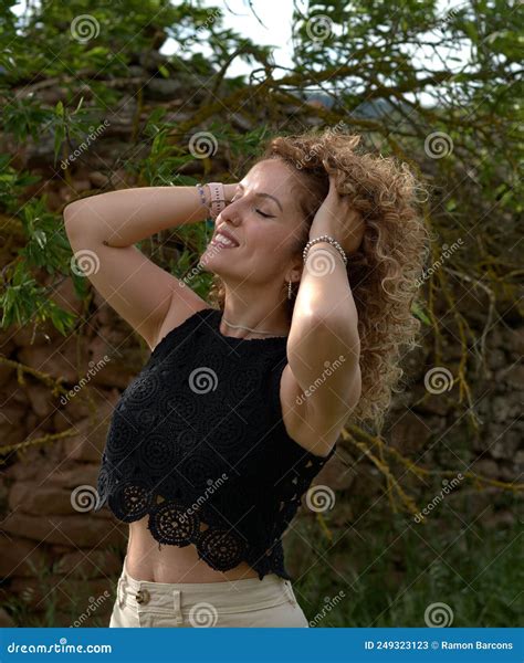 Pink Young Girl Stroking Her Hair With Her Hands Stock Image Image