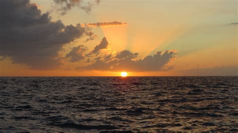 Free Images Sea Coast Water Ocean Horizon Cloud Sky Sun Sunrise Sunset Sunlight