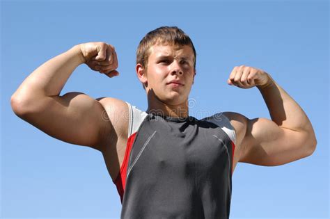 Flexing Biceps Stock Photo Image Of Attractive Look 1731296