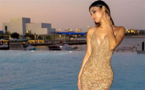 Mouni Roy Looks Ravishing As Ever In A Sexy Backless Golden Shimmery