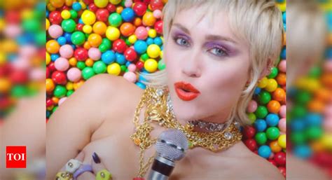 Miley Cyrus Strips Down In Self Directed Music Video Midnight Sky English Movie News Times