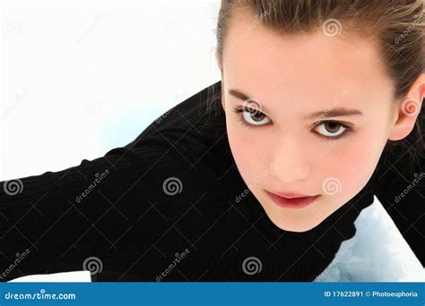 Tween Girl With Long Hair Wishing On A Daisy Stock Photo