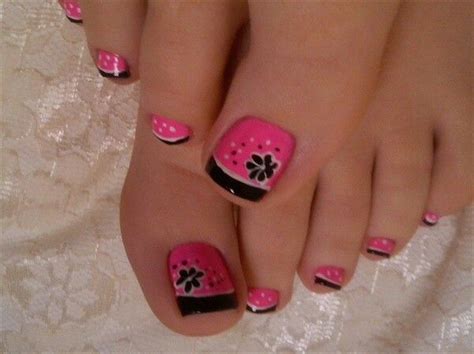 Check out our flower nail art selection for the very best in unique or custom, handmade pieces from our craft supplies & tools shops. Pretty pedicure: pink with black French tips and a black ...