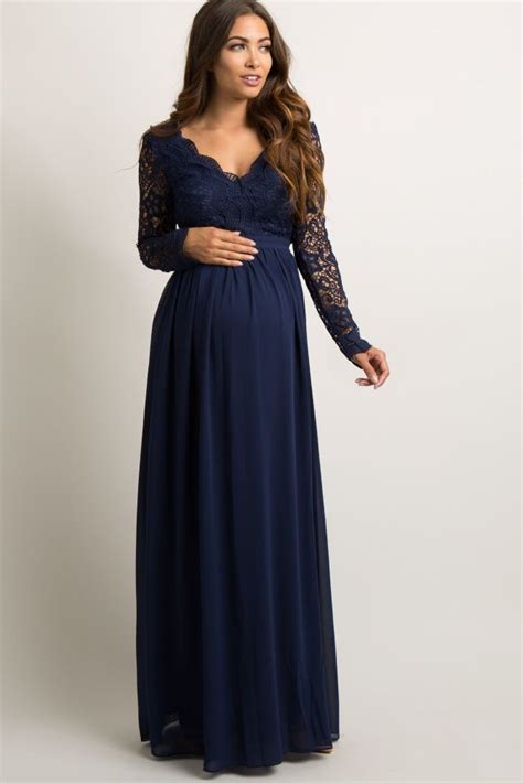 A Solid Hued Maternity Evening Gown Featuring A Semi Sheer Scalloped