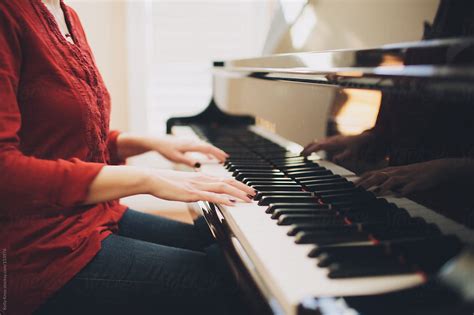 Woman Playing The Piano By Stocksy Contributor Kelly Knox Stocksy