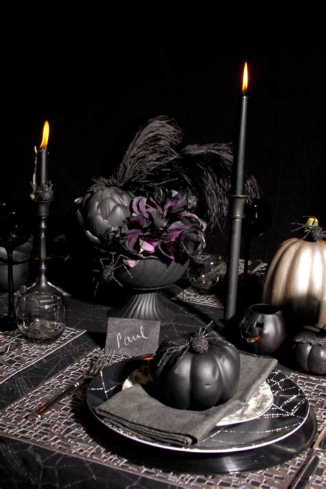 Add in some fall flowers, a black bird, and a vase full of acorns, and you've got the ideal halloween table decoration for your family to enjoy. Top Pinterest Home Decor Ideas for your Halloween Party