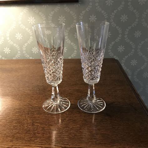 Pair of Cased Waterford Crystal Champagne flutes Lismore Pattern