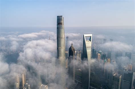 Alibaba cloud develops and delivers a comprehensive suite of highly scalable platforms for. Shanghai Skyscrapers Above The Cloud Stock Photo ...