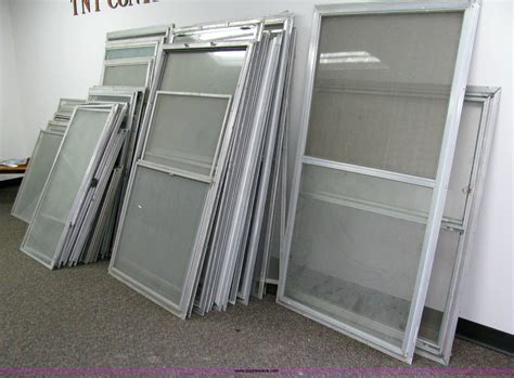 27 Assorted Aluminum Storm Windows With Screens In Coffeyville Ks