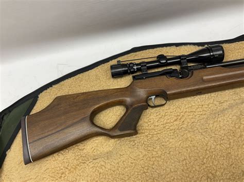 weihrauch hw100 22 calibre pcp repeating air rifle walnut thumbhole stock with textured pistol