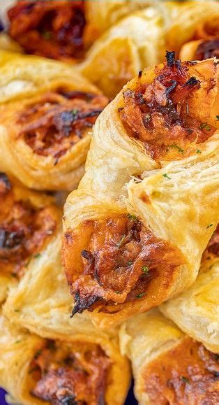Smoky pulled pork tossed with bbq sauce and cheese then baked in puff pastry. pulled pork pastry puffs | Recipes, Appetizer recipes, Food
