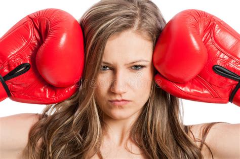 Beautiful Female Model With Boxing Gloves And Serious Face Stock Image