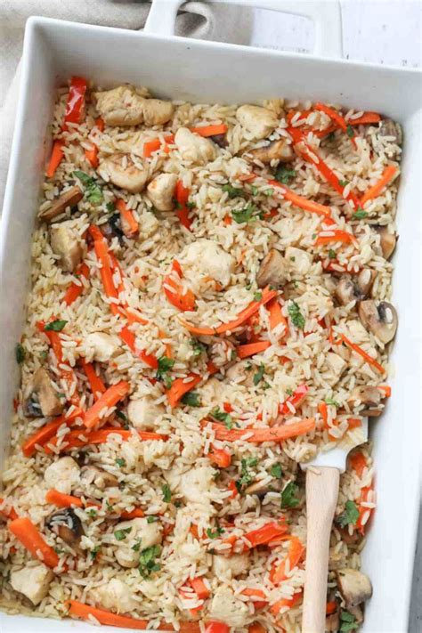 Add the garlic and tomato and mix again. Easy Oven Baked Chicken and Rice with Vegetables ready to ...