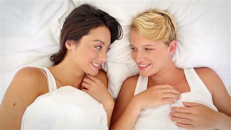 Lesbian Couple Cuddling In Bed Stock Footage Video 100